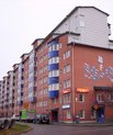 Housing block with red bricks.