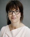 Colour head shot of female academic Elisabeth Staksrud.