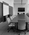 An empty meeting room, black and white